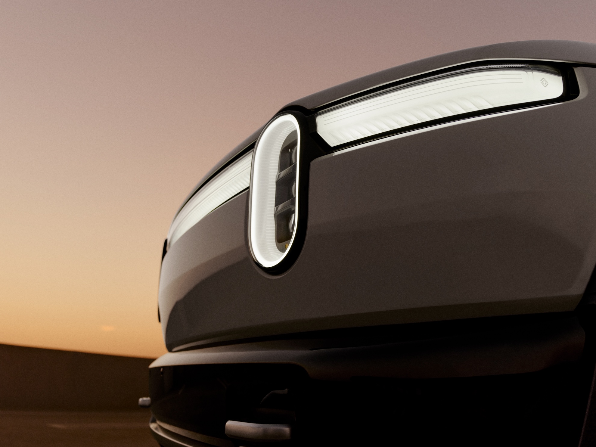 rivian raises sales