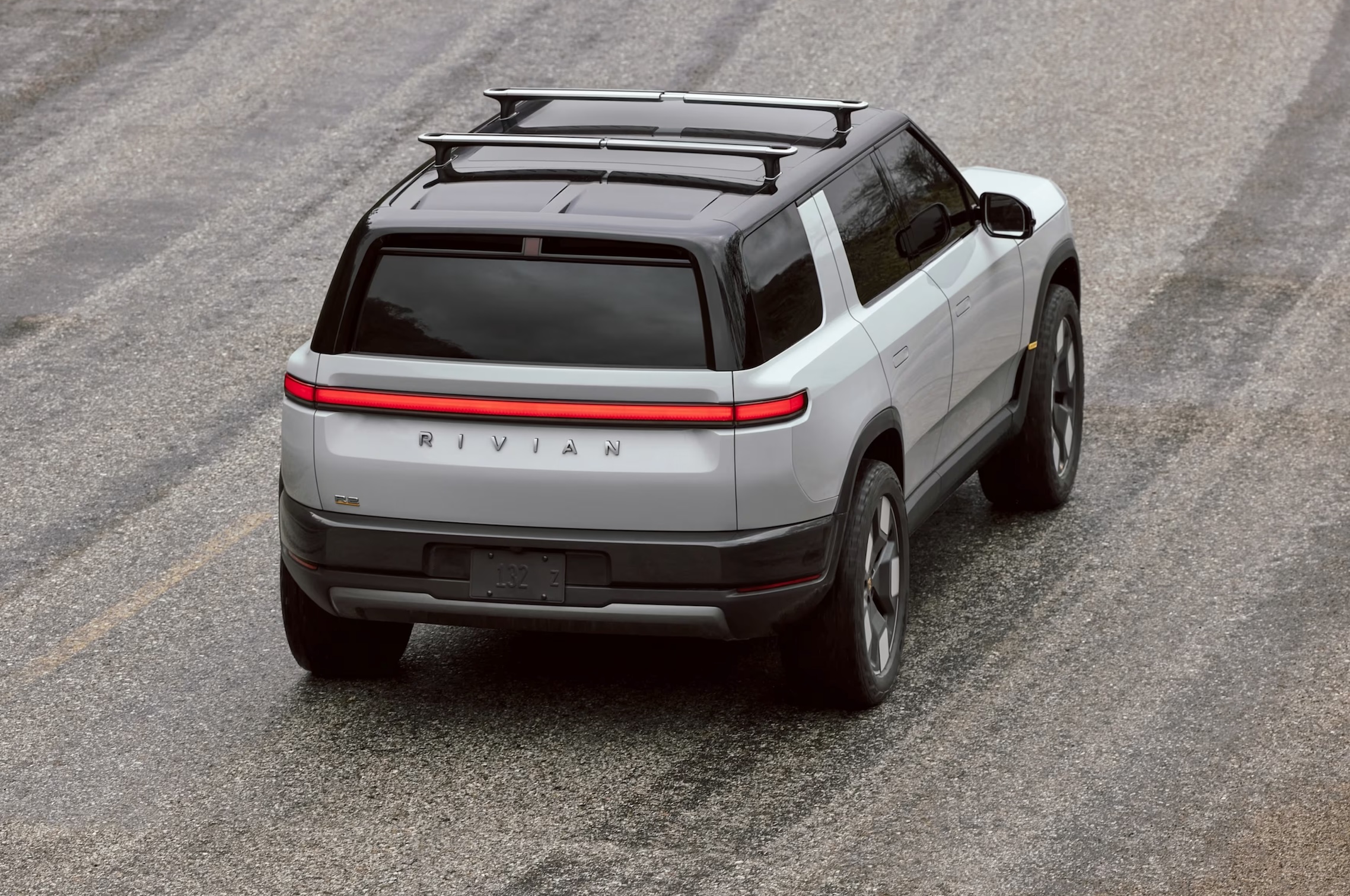rivian cuts hundreds