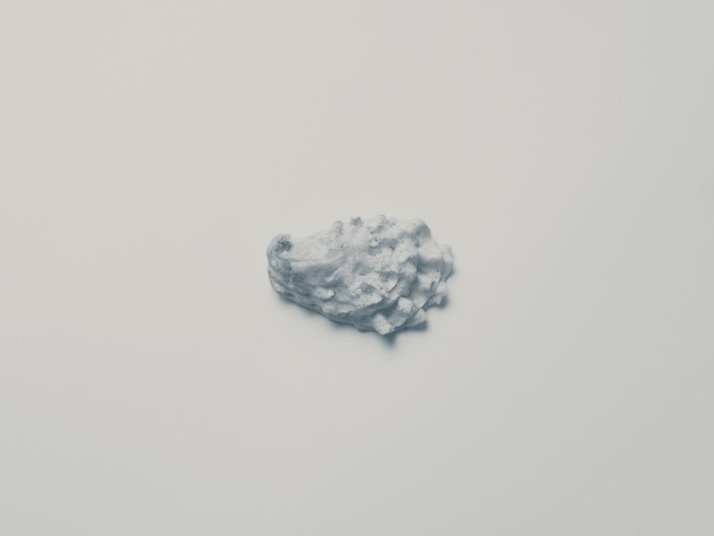 white stone on white surface