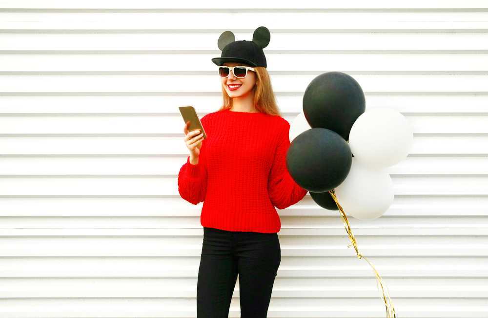 Disney Influencer taking a selfie for blog post work at home jobs for disney lovers.png