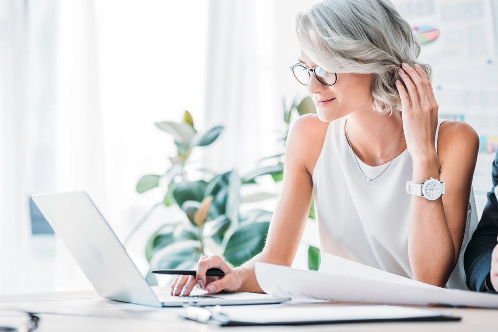 Woman on her laptop working from home with Amazon.png