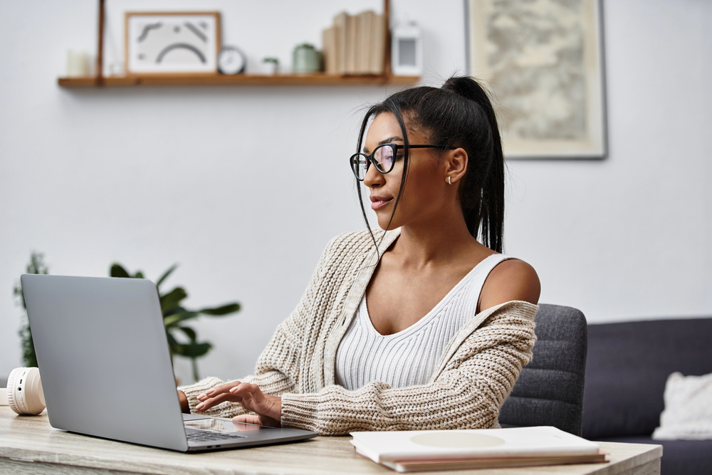 Young woman searching for work at home jobs with Google.png