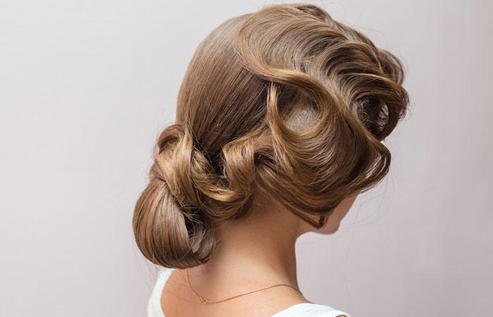 A woman sporting a 1920s hairstyle for long hair.jpg