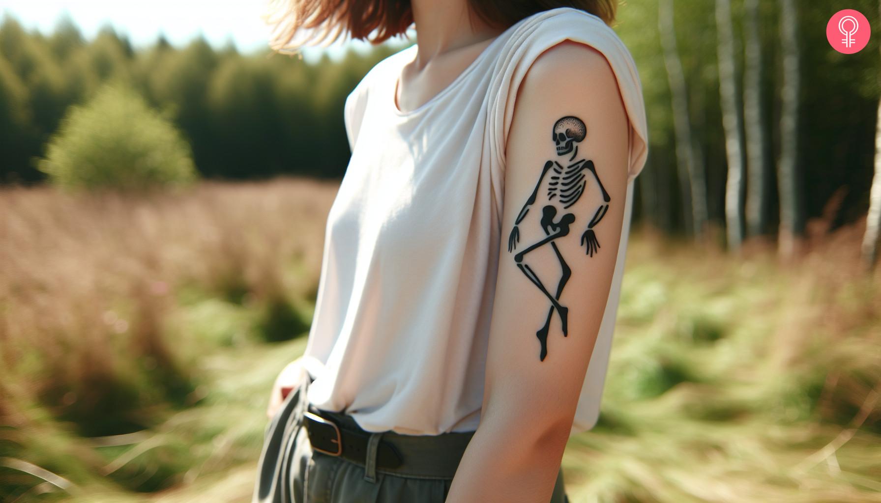A woman with a tattoo of a black skeleton doing a dance step.jpg