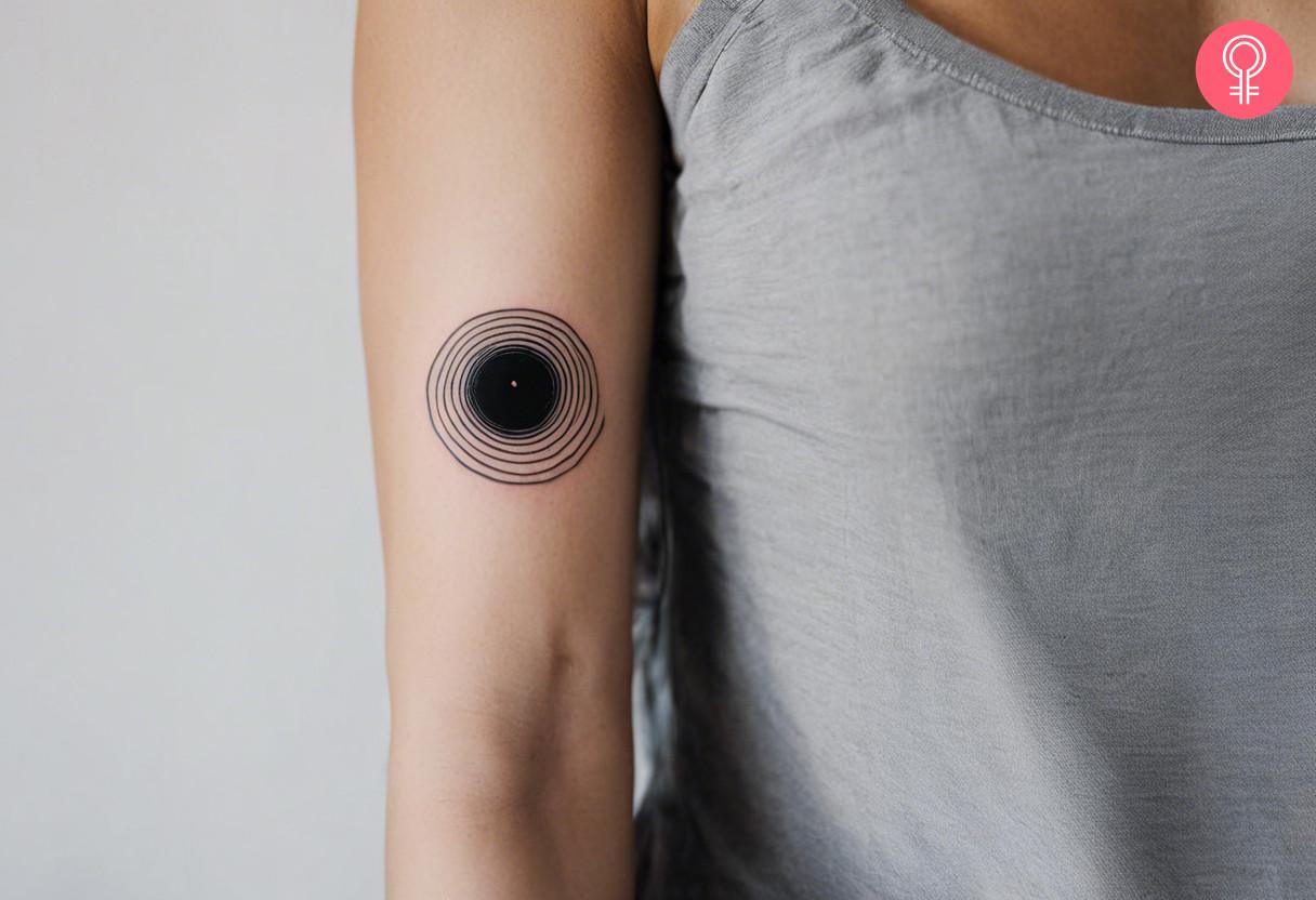 Minimalist Black Hole Tattoo.jpg
