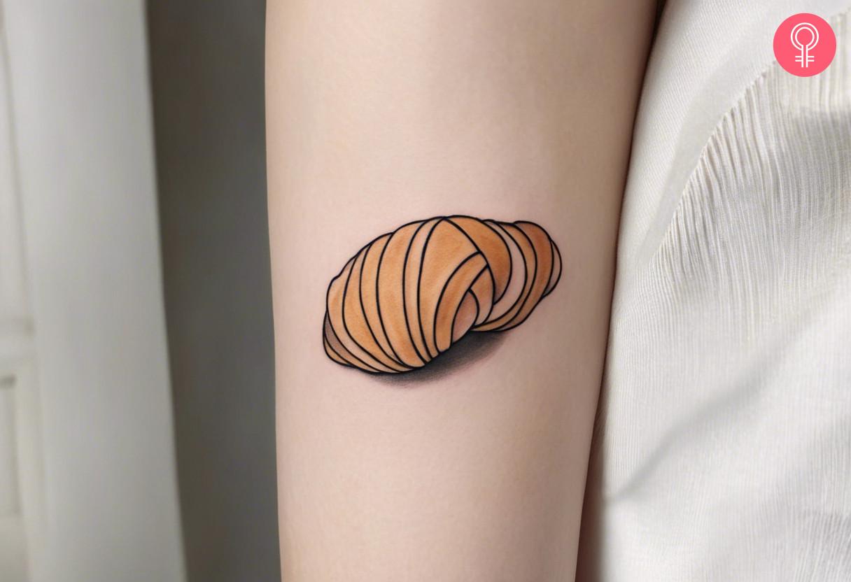 Minimalist Croissant Tattoo.jpg