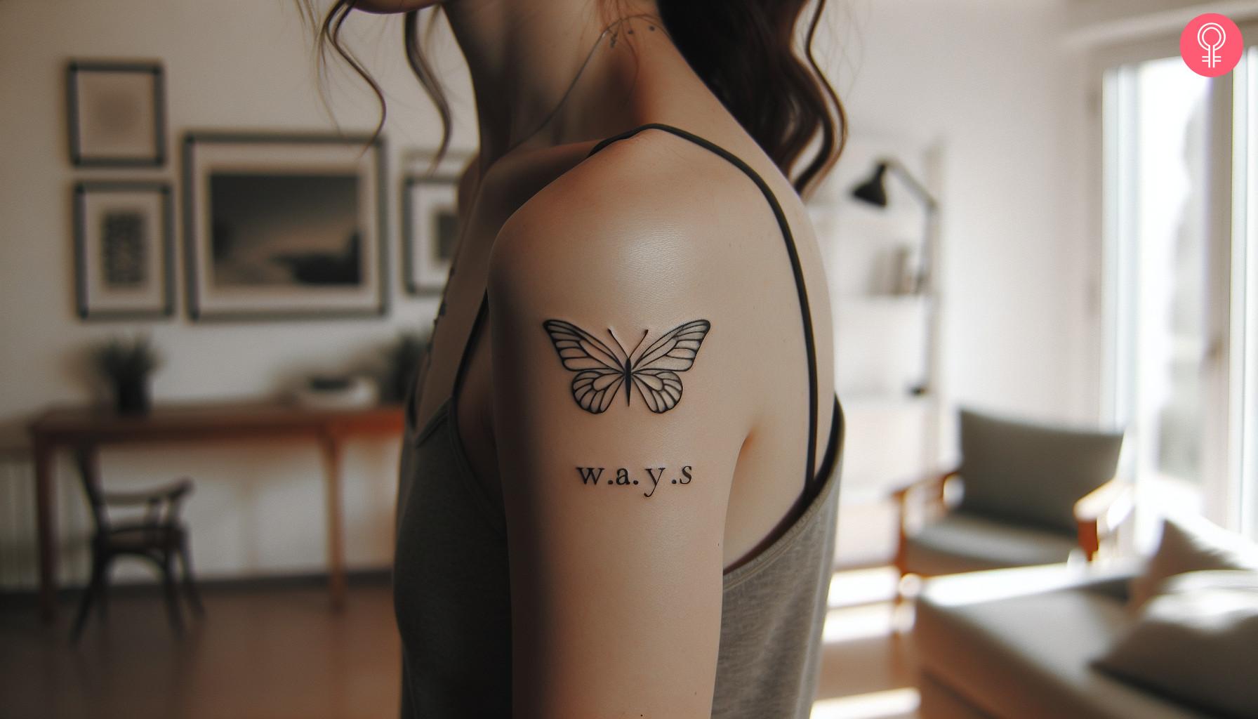 Minimalist W A Y S tattoo with a butterfly on the upper arm.jpg