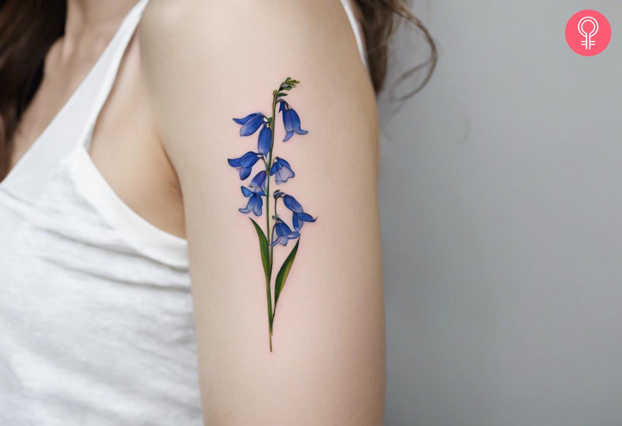 Minimalist bluebell flower tattoo.jpg