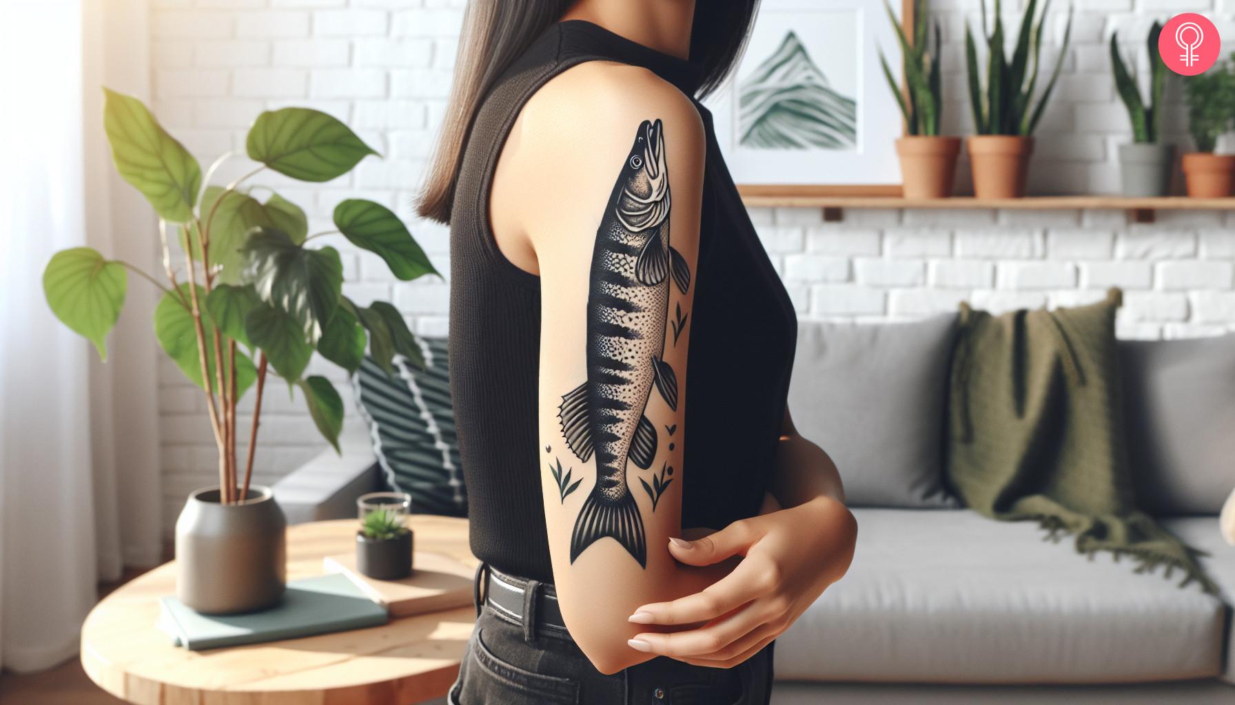 Northern pike tattoo on the upper arm of a woman.jpg