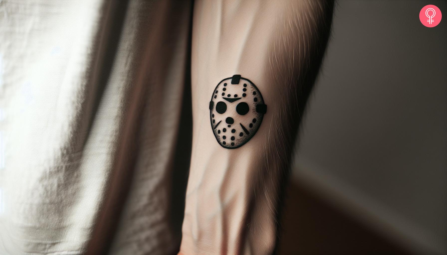 Small Jason Mask Tattoo.jpg