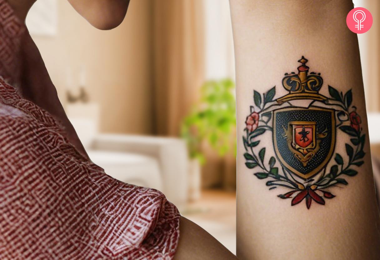 Woman with traditional family crest tattoo on her forearm.jpg