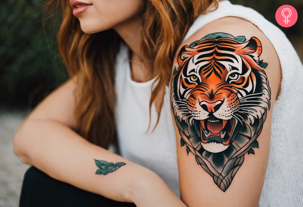 A woman with a fierce tiger tattoo on her upper arm.jpg