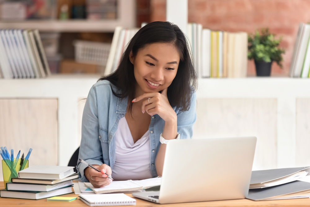 A college Student applying online to be a Studypool Tutor.jpeg