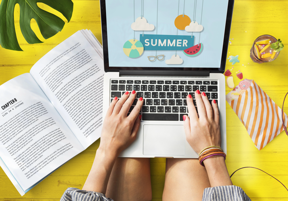 Woman looking online for summer jobs for teachers.png