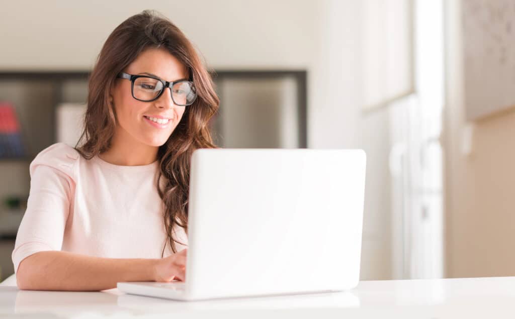 9 Game-Changing Moves That Ended Paycheck-to-Paycheck Living 6 Depositphotos 22652109 Xwoman computer 1024x635.jpg